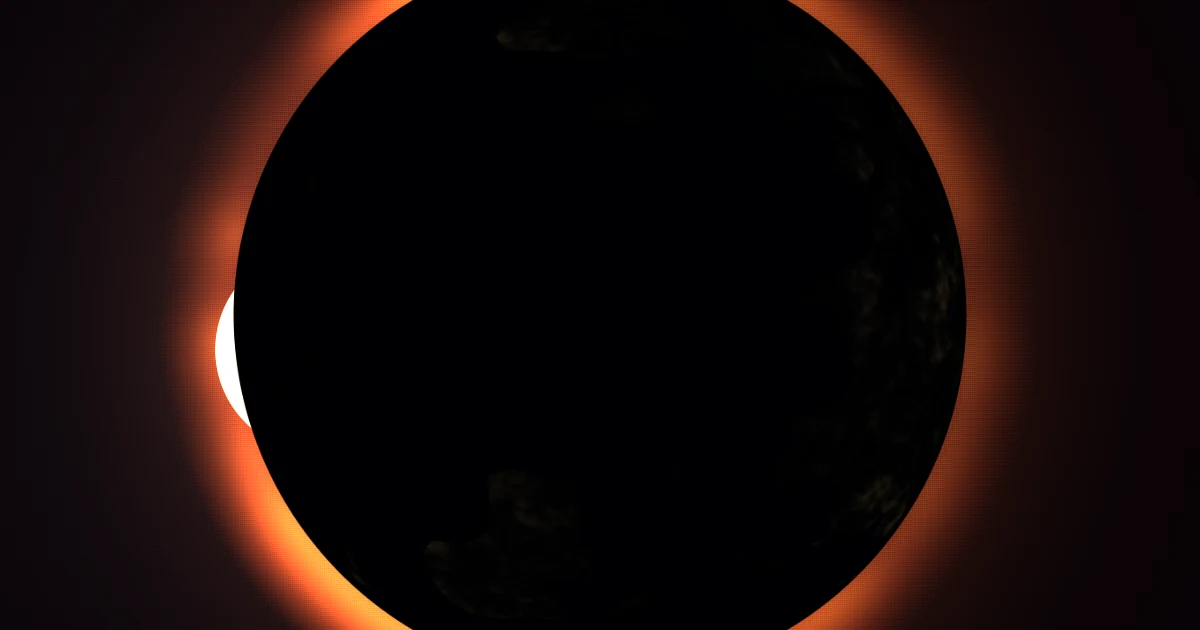 A closer view of the eclipsed Sun behind the dark disc of Earth.
